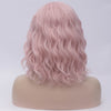 Natural light pink medium curly middle part wig by Smart Wigs Sydney